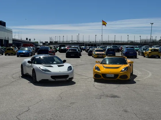 The Exige parked among other cars in a circuit paddock